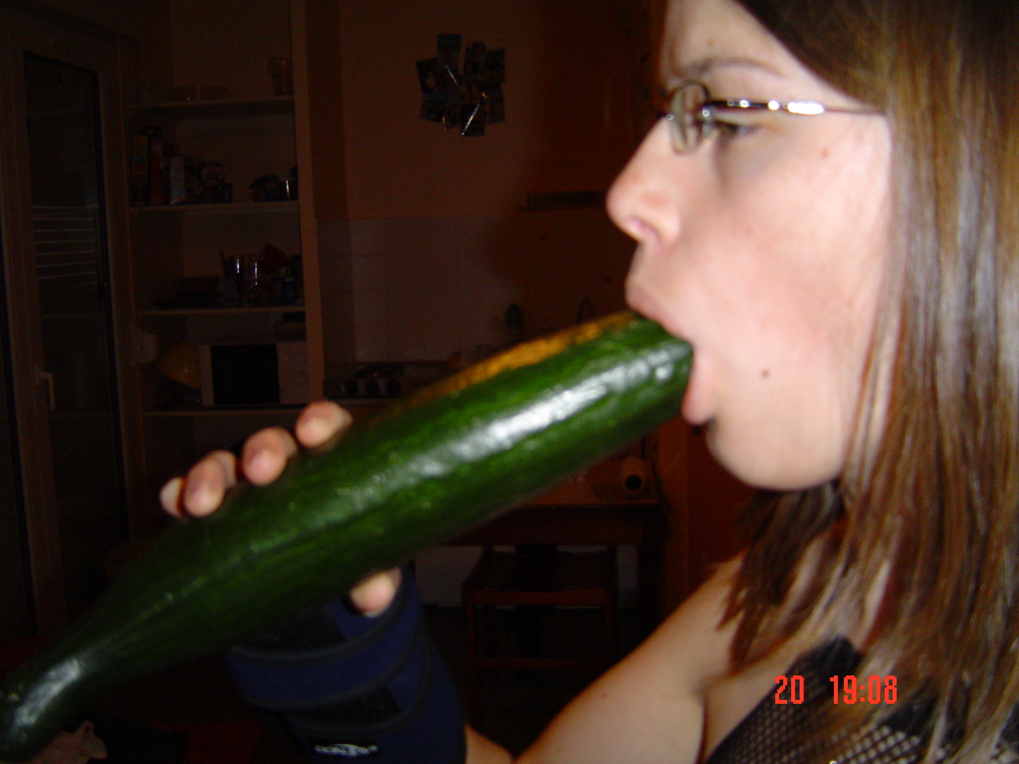 Girl and cucumber.