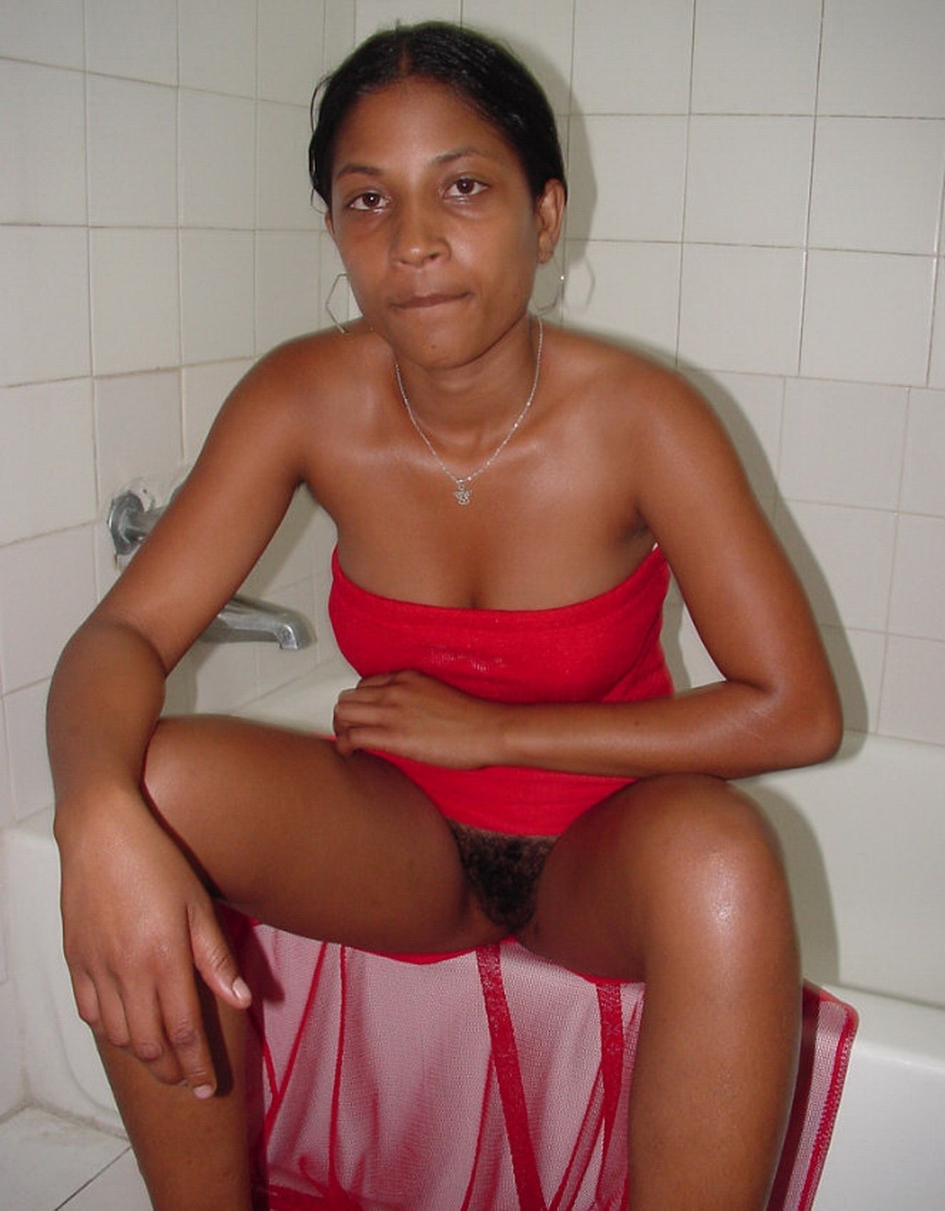 Teen model from Sri Lanka naked in the woods and in the bathroom.