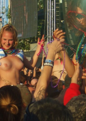 The girls flashing boobs at a rock concert