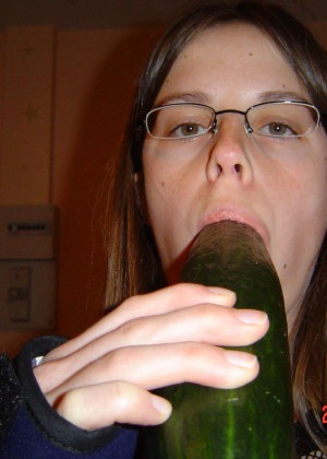 Girl and cucumber