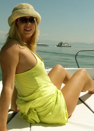 Photo of a woman sunbathing on a boat