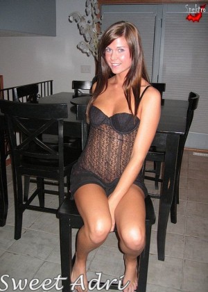 Audrey shows pussy sitting on a chair