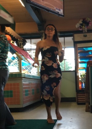 Leg of under Mexican's dress in cafe